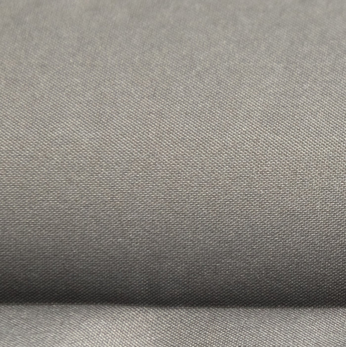 Detailed view of Zenbivy mattress fabric showcasing the tightly woven 75D polyester taffeta. The grey material has a visibly more textured and durable weave, designed for outdoor longevity.
