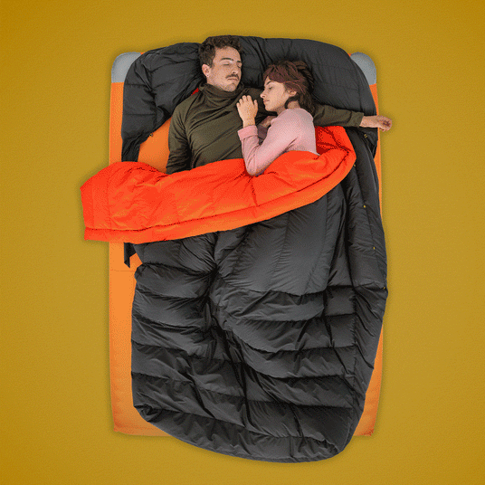 Top-down view of two people sleeping in a Zenbivy double bed system.