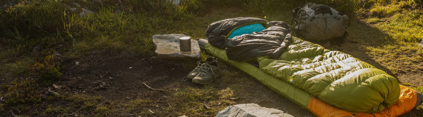 Zenbivy Light Bed complete bundle sleep system laying on the ground in the mountains