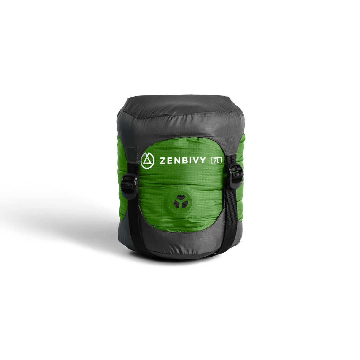 A green Zenbivy Dry Sack with compression caps cinched down to make it as compact as possible.