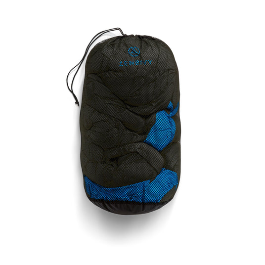 Zenbivy sleeping bag stored in a black mesh storage sack with drawstring closure.