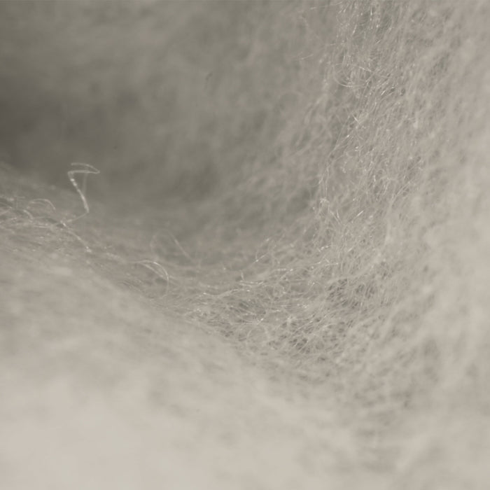 Close-up of Zenbivy's synthetic hood insulation, highlighting the soft, down-like polyester blend used for budget-friendly comfort.