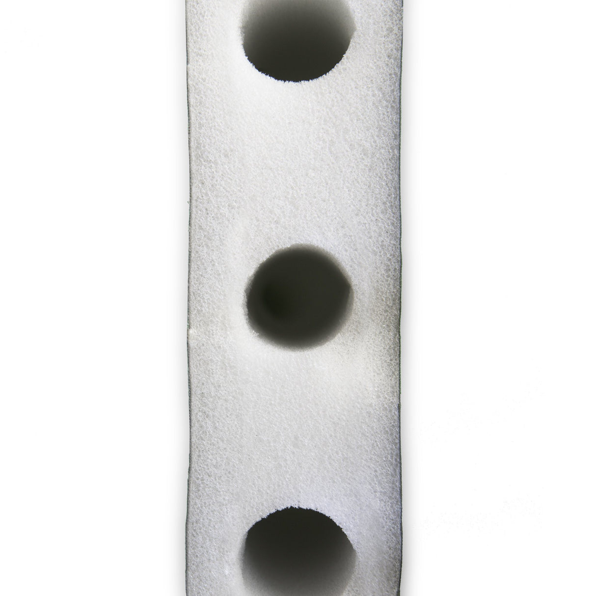 Close-up of horizontally-cored urethane foam used in Zenbivy mattresses, showing evenly spaced horizontal holes designed to minimize cold spots and improve insulation.
