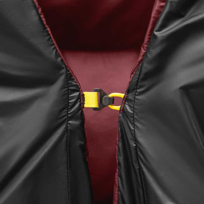 Close-up of Zenbivy quilt’s lightweight clip attachments, ensuring a secure, draft-free connection to the sleep system while maintaining minimal weight.