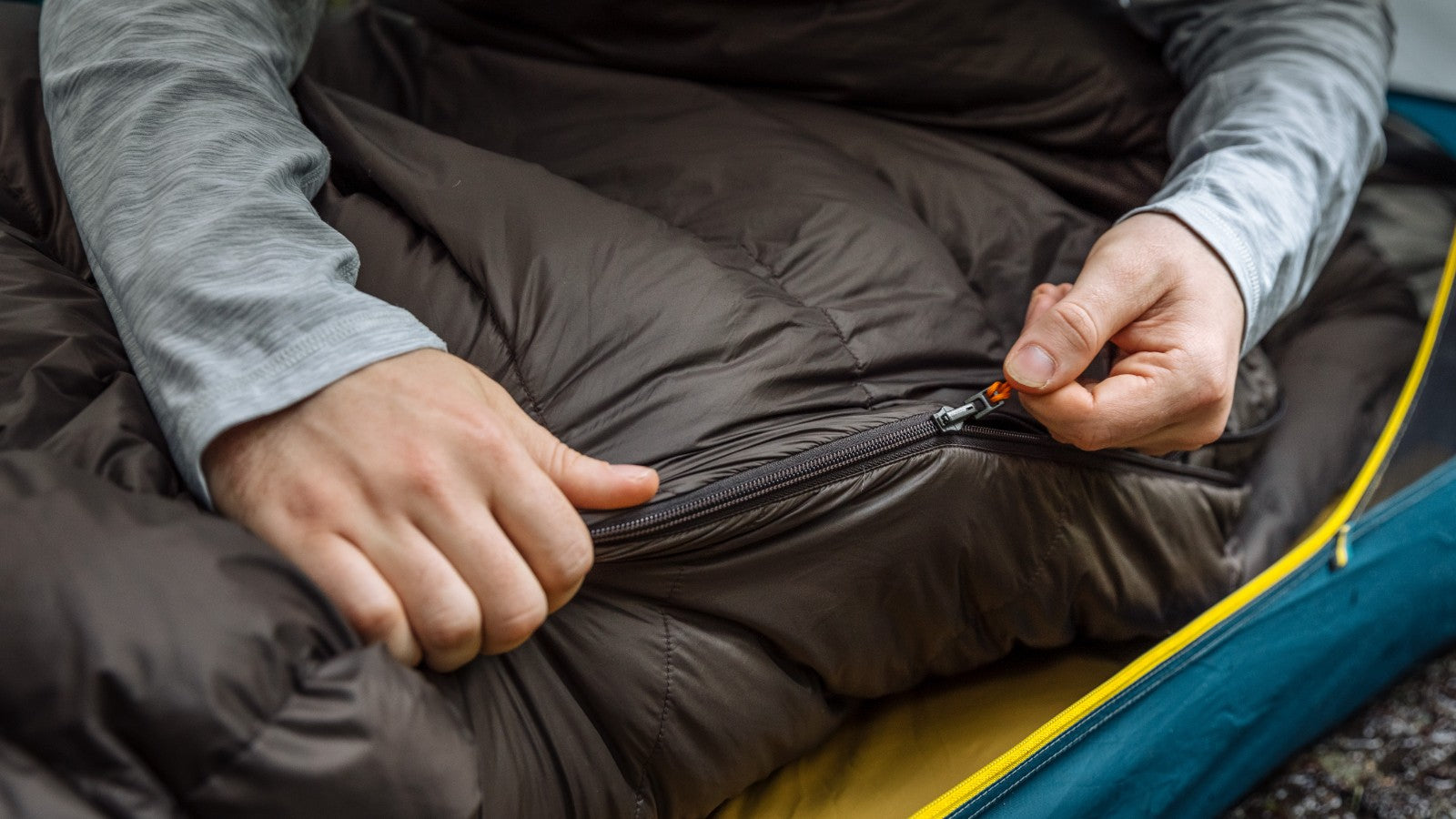 Zipping the convertible top quilt onto the fitted sheet to create a complete sleeping bag. The Zenbivy Bed has been designed with both left and right side zippers to let you sleep exactly how you want to. Take a tour of the original Zenbivy Bed